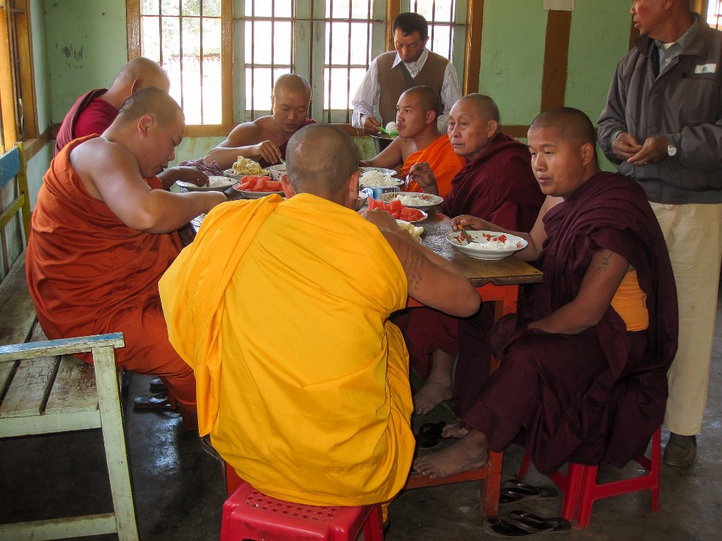 11-Monks enjoing the free meal.jpg -                                